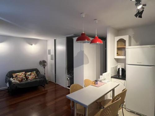 Cozy sunny entire apartment in the 16th arrondissement of Paris with a panoramic view of the Eiffel Tower just 3 minutes from the door Includes kitchen, bathroom, and living room