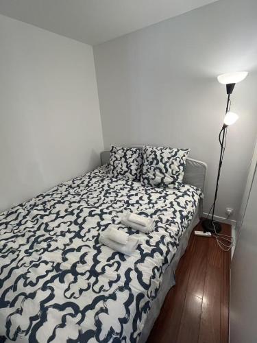 Cozy sunny entire apartment in the 16th arrondissement of Paris with a panoramic view of the Eiffel Tower just 3 minutes from the door Includes kitchen, bathroom, and living room