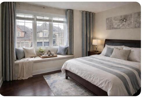 a bedroom with a large bed and a window at Quite Cozy Private Room In Vaughan with Private Bathroom and Free Parking in Vaughan