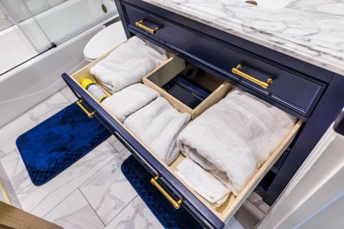a drawer in a bathroom with towels in it at Lovely 2bedroom next to Santa Monica college in Los Angeles