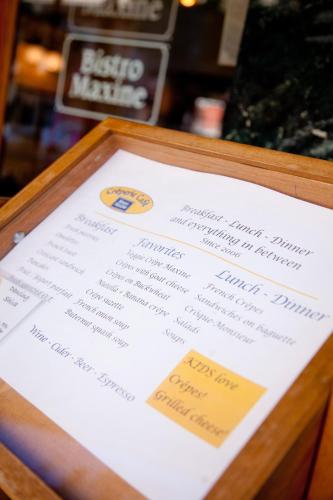 a menu for a restaurant with a picture of the menu at Cardinal Hotel in Palo Alto