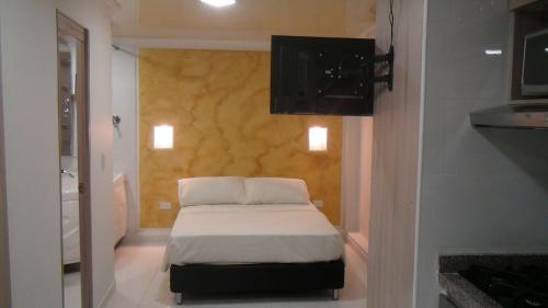 Кровать или кровати в номере San San Andrés Casa Vacacional 2 by bbbsai