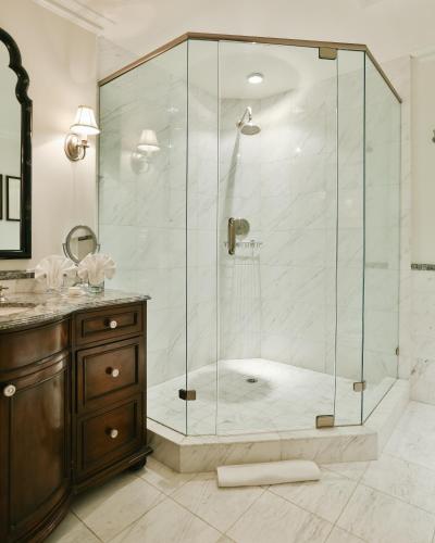 a shower with a glass enclosure in a bathroom at 27 North in Healdsburg