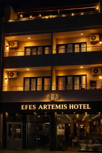 a hotel with a sign that reads feesagents hotel at Efes Artemis Hotel in Selçuk