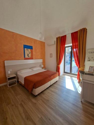 Llit o llits en una habitació de San Max Hotel