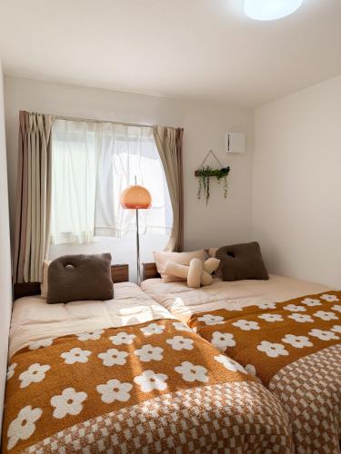 Wakyo Leeye-Newly built in 2026 Entire building-single unit with 3 bedrooms-can accommodate 7 people Free parking Direct access to USJ Namba Kyocera Dome