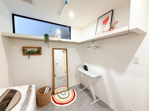 Wakyo Leeye-Newly built in 2026 Entire building-single unit with 3 bedrooms-can accommodate 7 people Free parking Direct access to USJ Namba Kyocera Dome
