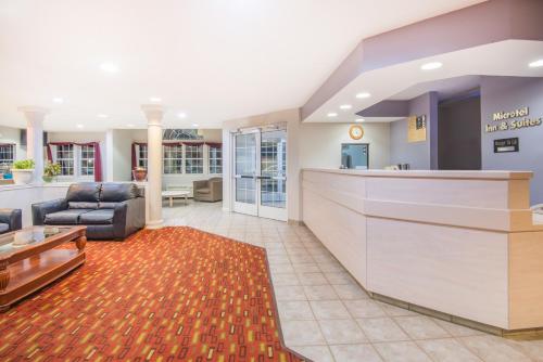 a lobby of a hospital with a waiting room at Microtel Inn & Suites Claremore Route 66 in Claremore