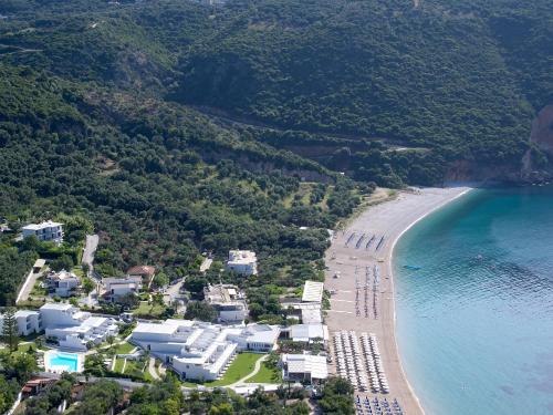 an aerial view of a beach and the ocean at Lichnos Beach in Parga