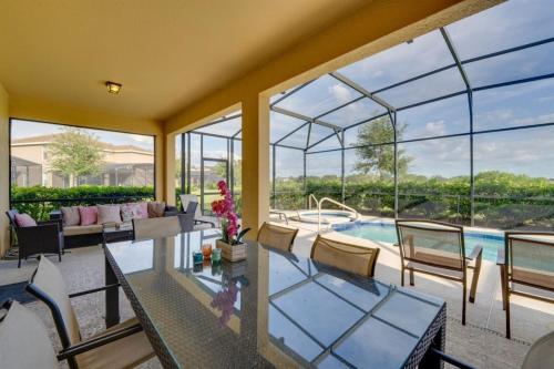 7BR Resort Pool Home Near Disney - 8004 photo 5