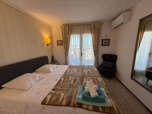 a bedroom with a bed with a cross on it at AwayDays - 107 - Apartamento 2 Dormitorios con Wi-Fi in Empuriabrava