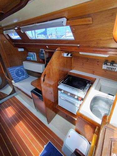 an interior view of a kitchen in a boat at Miramare in Playa Blanca