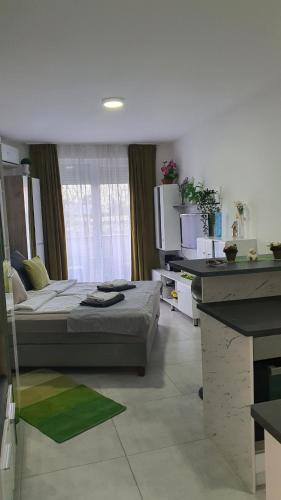 a bedroom with a bed in a room at Harmony Srebrno jezero in Veliko Gradište