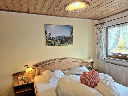 a bedroom with two beds with hearts on them at Gästehaus Watzmannblick in Bischofswiesen