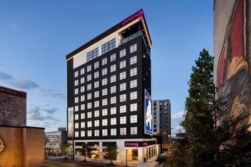 a tall black building on a city street at Moxy Atlanta Downtown in Atlanta