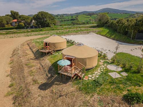 an overhead view of two tents in a field at Amapolas agri glamping in Camerano