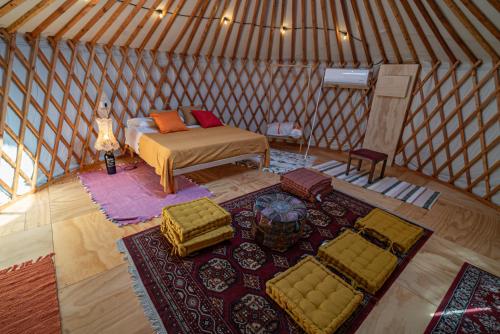 an overhead view of a room in a yurt at Amapolas agri glamping in Camerano