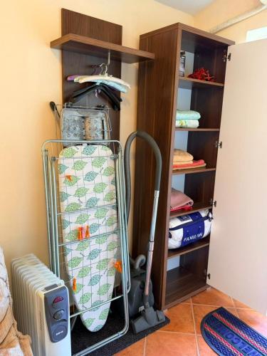 a room with a closet with a rack of clothes at Neva in Budva