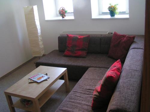 a living room with a couch and a coffee table at hausamsolschacht in Bad Kösen