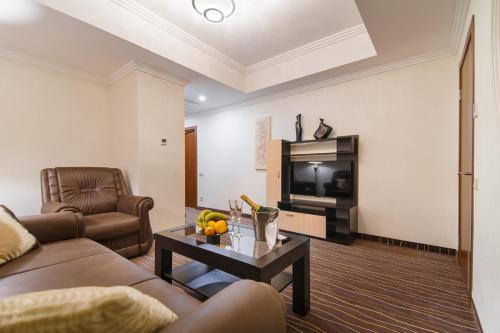 TV a/nebo společenská místnost v ubytování Abri Hotel