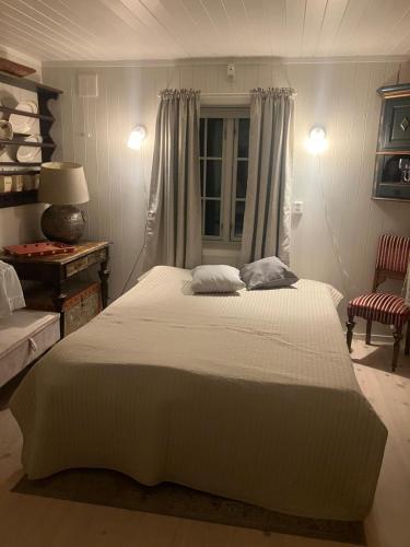a bedroom with a large bed with two pillows on it at Vacation Home in Oslo in Oslo