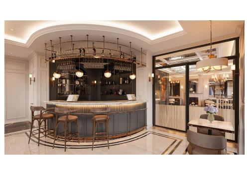 a bar in a restaurant with chairs and a table at Hotel Montmartre de Sapa - Newly Opened April 2026 in Sapa