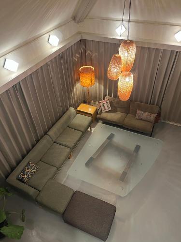 an overhead view of a living room with a couch at ROHAUS Entire Home with private Hot Spring in Shiraoi