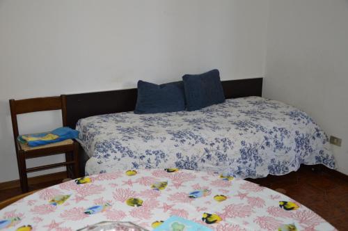 Postel nebo postele na pokoji v ubytování Casavacanze Zeus