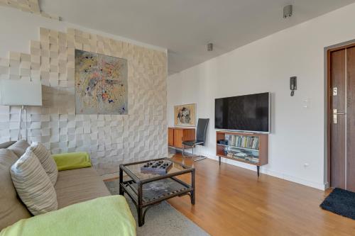Nadmorski apartament z tarasem przy plaży by Grand Apartments