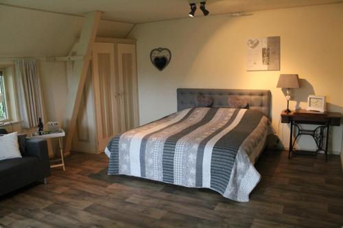 Posteľ alebo postele v izbe v ubytovaní De Groote Medwert