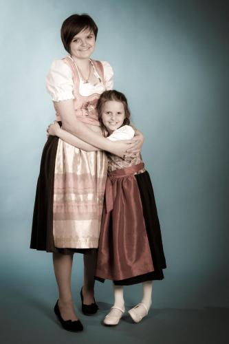 a woman and a little girl posing for a picture at Hotel Alpenblick in Bach