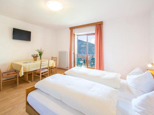 Postel nebo postele na pokoji v ubytování Gasthaus Gasteiger