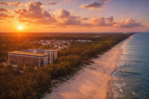 an aerial view of the shoreline of a beach at Prestige 613 - tuż przy plaży - basen, sauna, jacuzzi w cenie pobytu - Easy - Rent Apartments in Pobierowo