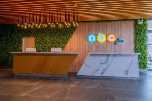 an office with two laptops on top of a counter at ABC Plus Hotel & Homes in Cebu City