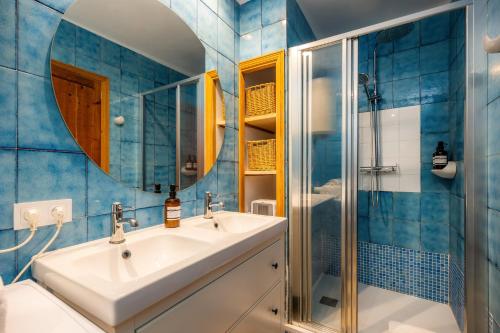 a bathroom with a sink and a shower at Ca'n Ruquet in Campanet