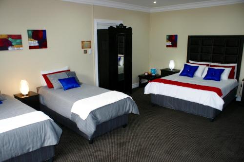 Cama ou camas em um quarto em Jolani Guest House