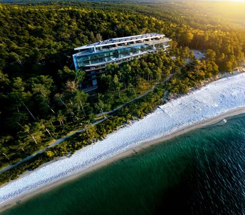an aerial view of a building on a beach at Baltic Jet Luxury Aparthotel in Ustronie Morskie
