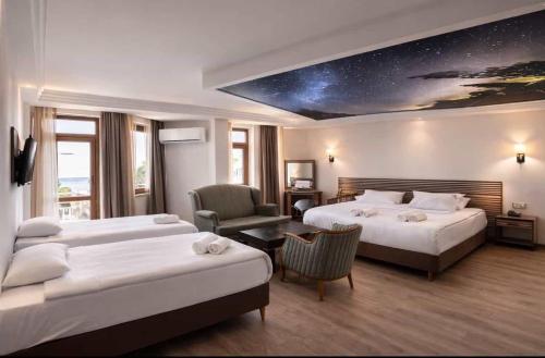 Кровать или кровати в номере Zel Hotel