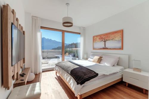 Laax Alpine Lodge by Quokka 360 - Stylish Apartment with Terrace and Stunning Mountain Views