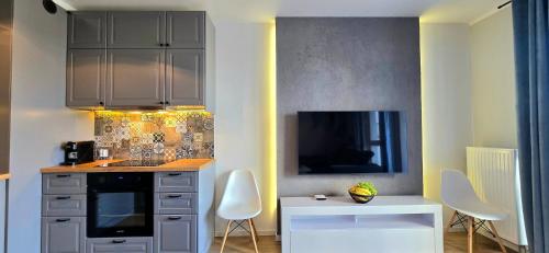 Apartment Old Town Residence by TriApart