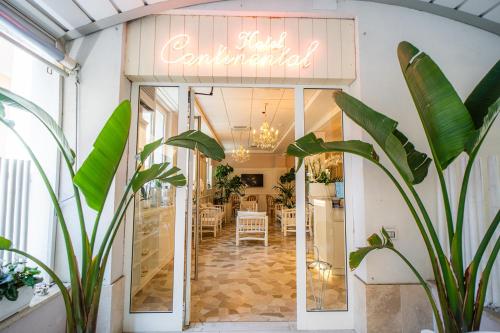 a store front with a sign that reads spell restaurant at Hotel Continental in Pietra Ligure