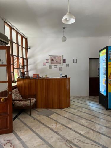 an office with a desk and a television in a room at Tiffany Otel in Özdere