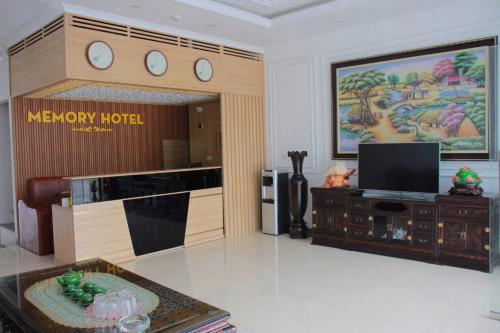 a living room with a new mgm hotel at A59 Memory Hotel Tuan Chau in Ha Long