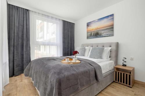 Enklawa - Apartamenty z Tarasem blisko Plaży i Jeziora by Noclegi Renters