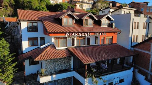 an overhead view of a building with red tile roofs at Makadam Hotel in Prizren