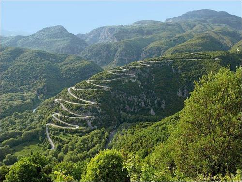 a winding road on the side of a mountain at Archontiko Geki 1876 in Papigko