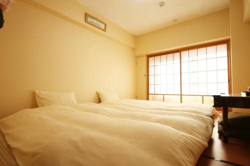 NAGAMORIYA 30 seconds walk from Shin-Osaka Station, free Wi-Fi, super convenient transportation access, J Type