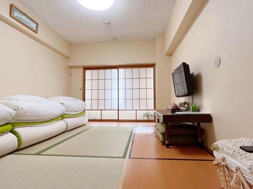 NAGAMORIYA 30 seconds walk from Shin-Osaka Station, free Wi-Fi, super convenient transportation access, J Type