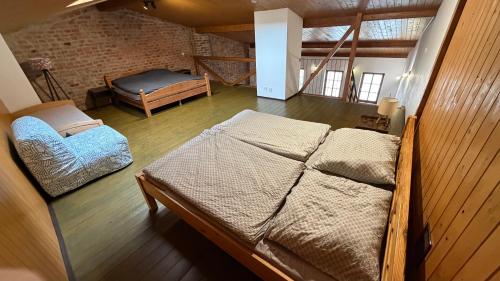 a bedroom with two beds in a room at Ubytování u Šimků in Broumov