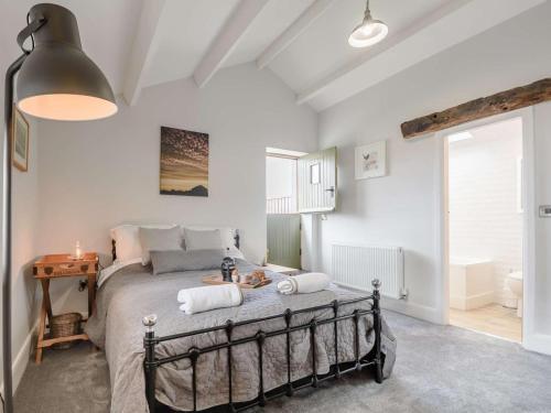 a bedroom with a large bed in a room at 2 Bed in Ormskirk oc-90263 in Barton